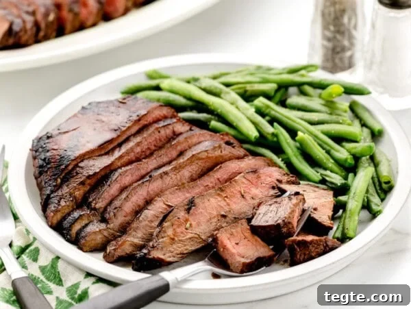 Classic Creamy Potato Salad Recipe for Picnics and BBQs 6 Flat iron steak recipe sliced and served with green beans.