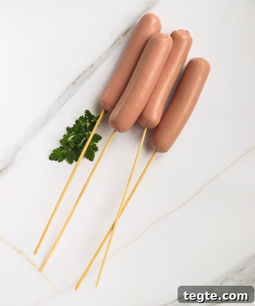 hot dogs on skewers for making homemade corndogs