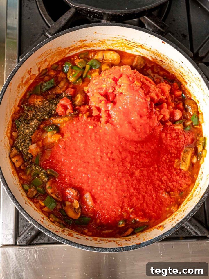 Chicken cacciatore sauce in a pot.