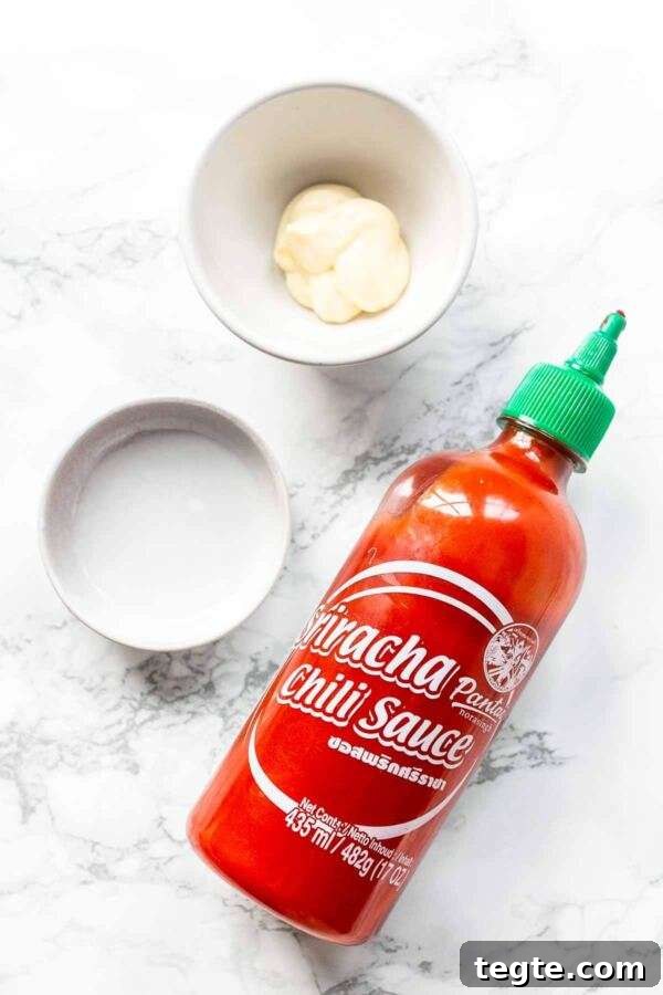 Creamy Spicy Mayo Recipe: Quick Homemade Sriracha Aioli 3 Ingredients for making a spicy mayo with sriracha chili sauce.