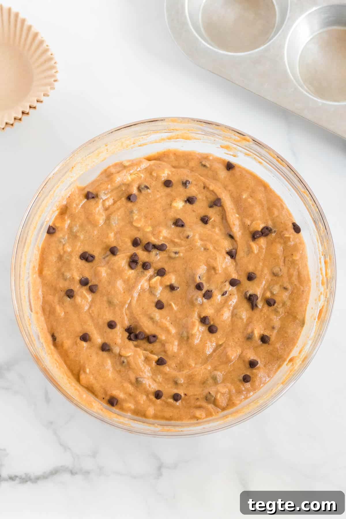 Pumpkin Chocolate Chip Muffins That Stay Moist and Flavorful 8 healthy pumpkin chocolate chip muffin batter in a bowl