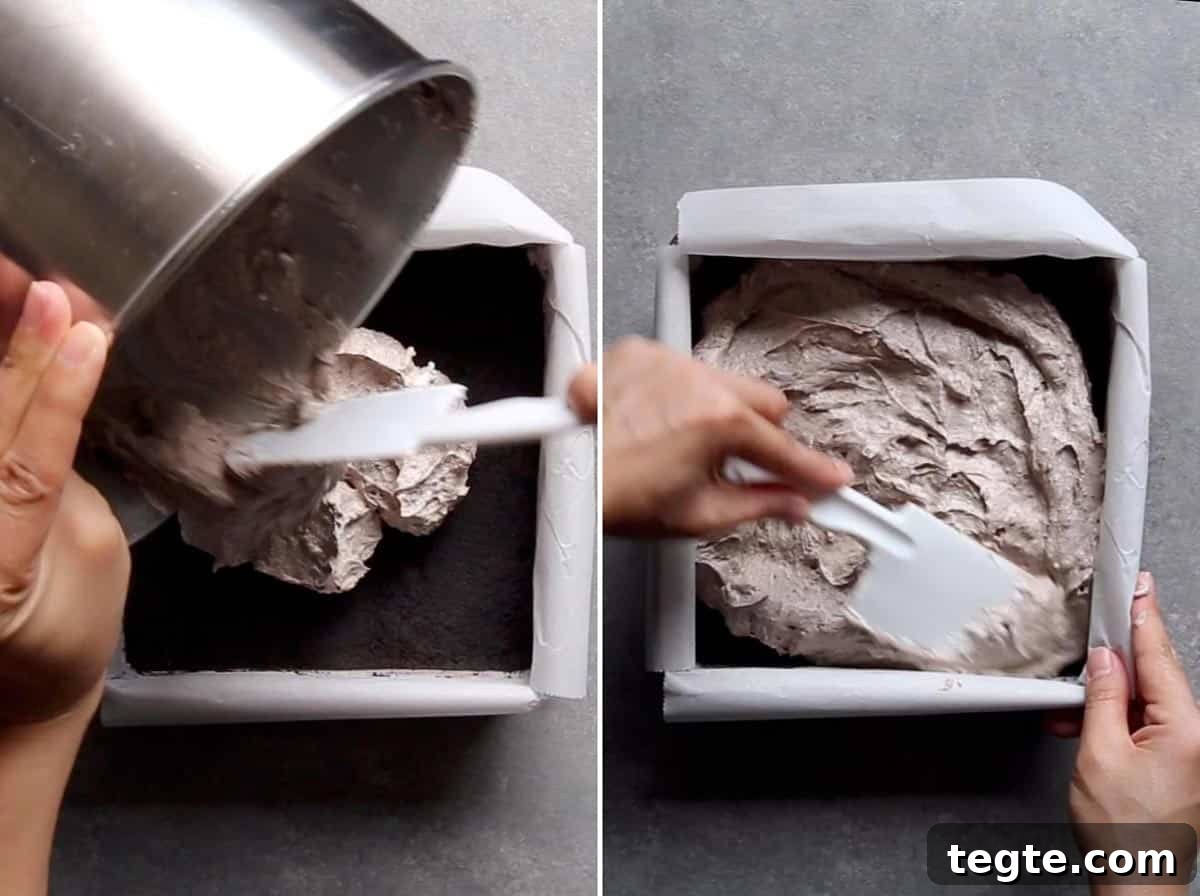 Adding Oreo cheesecake filling on top of the Oreo crust. Adding Oreo cheesecake filling on top of the Oreo crust.