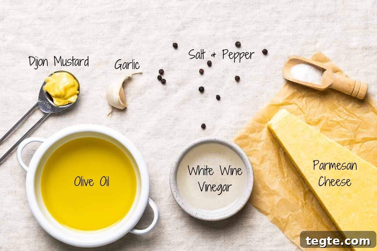 Parmesan Vinaigrette Ingredients on a linen cloth.