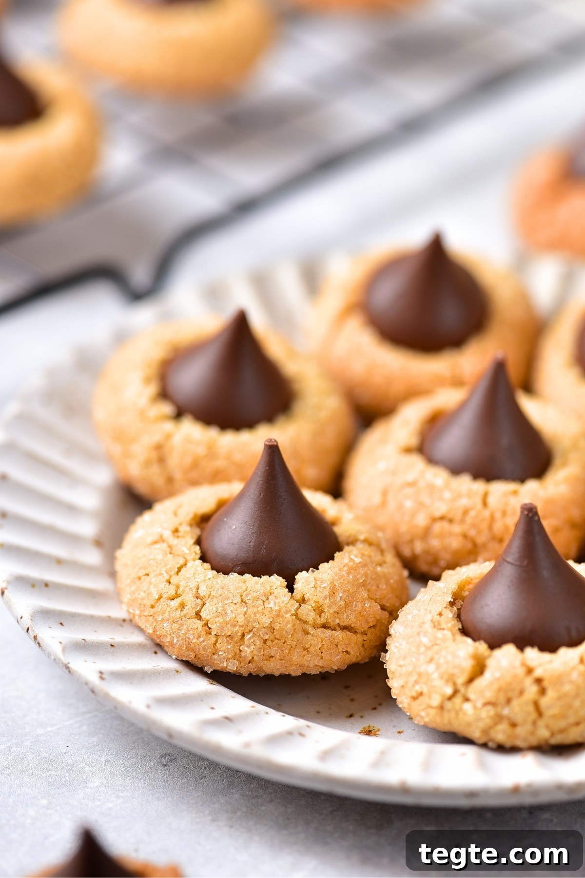 A plate of gluten-free peanut butter blossoms on board.