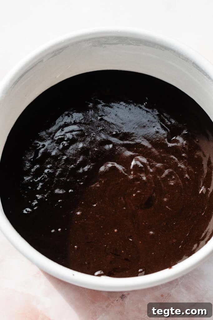 Eggless Chocolate Cake with Decadent Chocolate Fudge Frosting 6 A pan of cake batter.