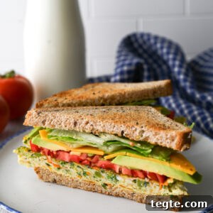 A wonderful make ahead breakfast of easy sheet pan eggs full of vegetables for the most delicious and convenient breakfast sandwich.