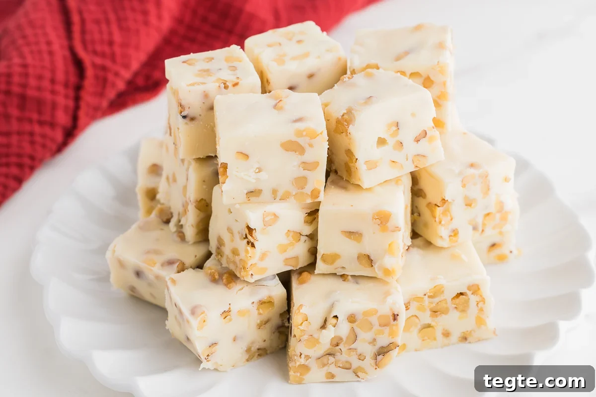 Maple Walnut Fudge Recipe: Creamy Homemade Candy with Nuts 7 fudge with nuts on a plate