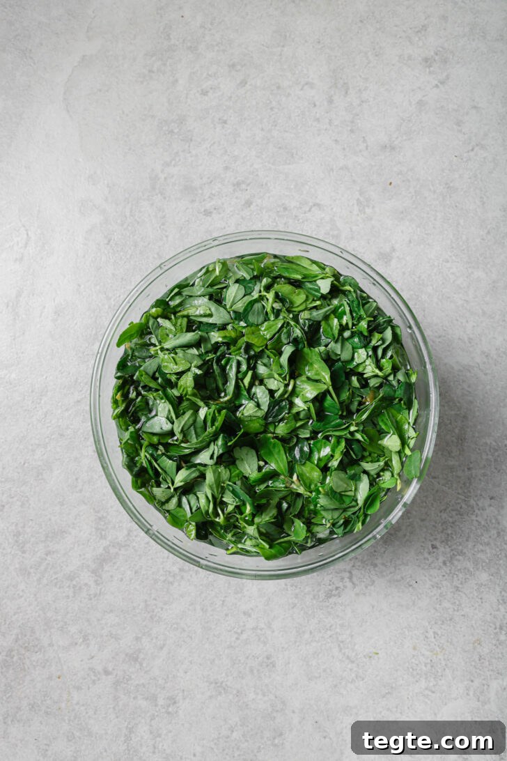 Fenugreek leaves soaked in a bowl of water