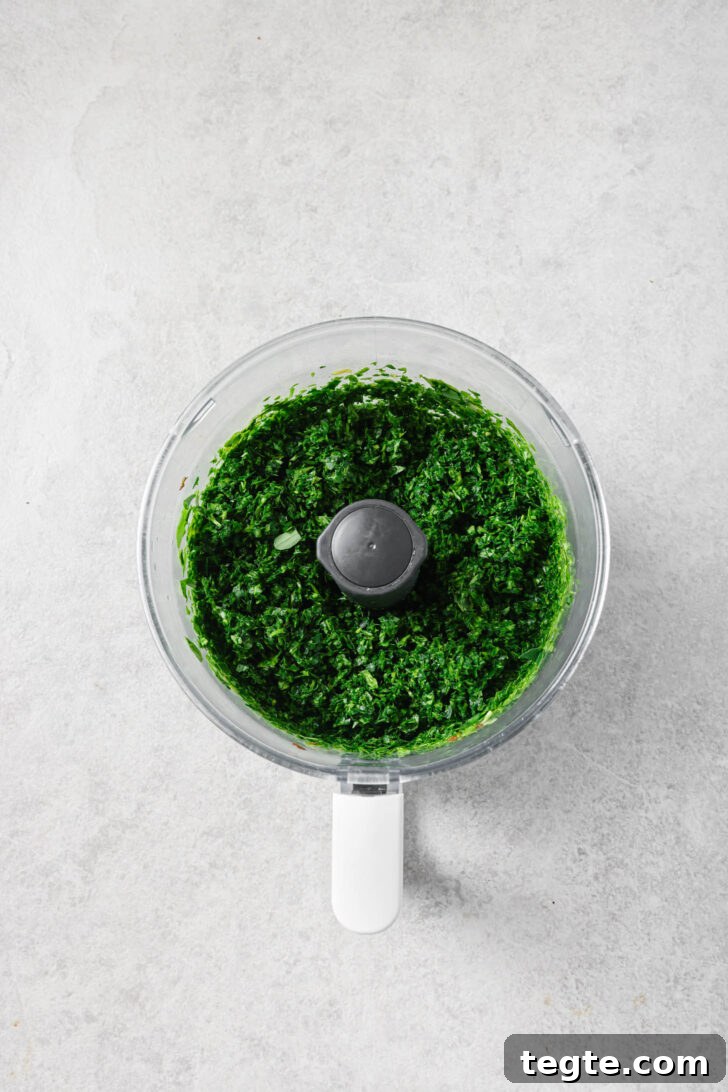 Chopped fenugreek leaves in a food processor