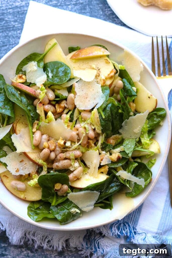 Apple, Spinach & White Bean Salad with Lemon Dijon Dressing 2 apple spinach white bean salad on plate with napkin and fork