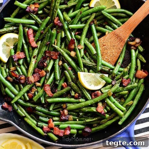 Sautéed Green Beans with bacon in a blue skillet
