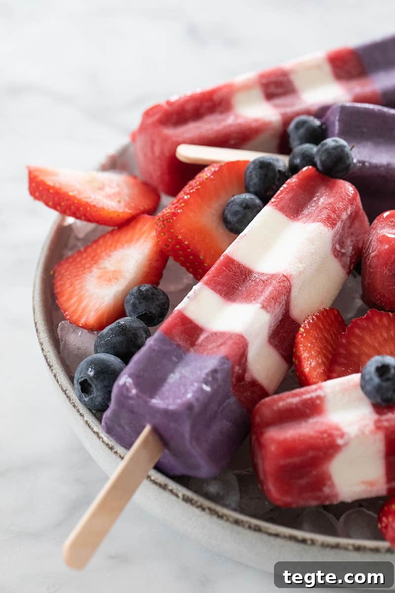 Strawberry Dessert Ideas for Entertaining Guests 13 Classic bomb pops made with fresh strawberries and blueberries.