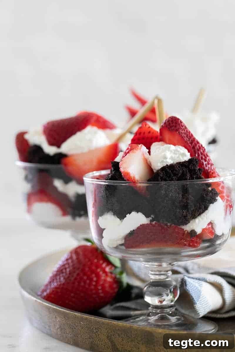 Strawberry Dessert Ideas for Entertaining Guests 6 Strawberry trifle with chocolate cake layered with whipped cream.
