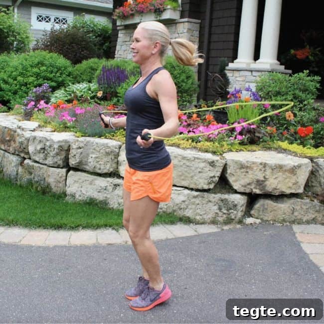 Outdoor Driveway Cardio and Strength Circuit for Women 3 Person exercising by jumping rope outdoors.