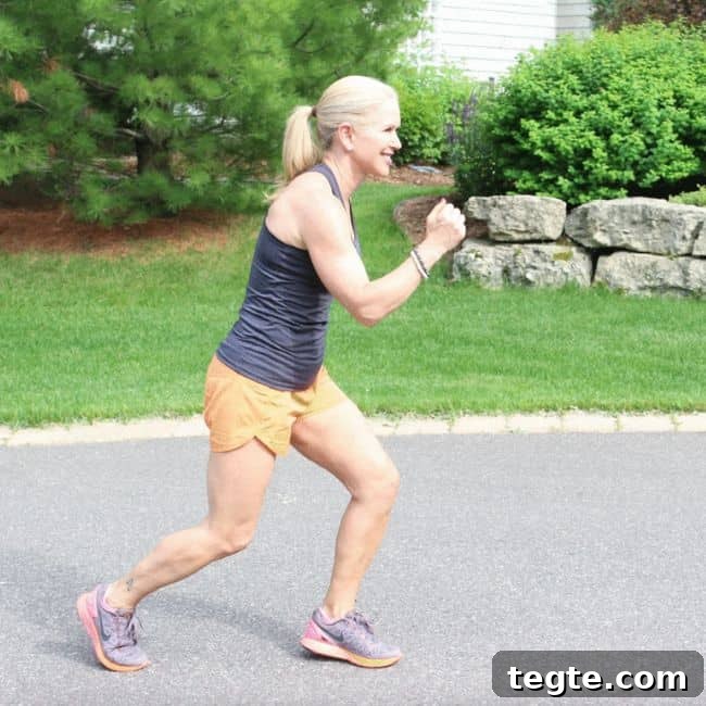 Outdoor Driveway Cardio and Strength Circuit for Women 9 Woman jogging on a sunny day outdoors.