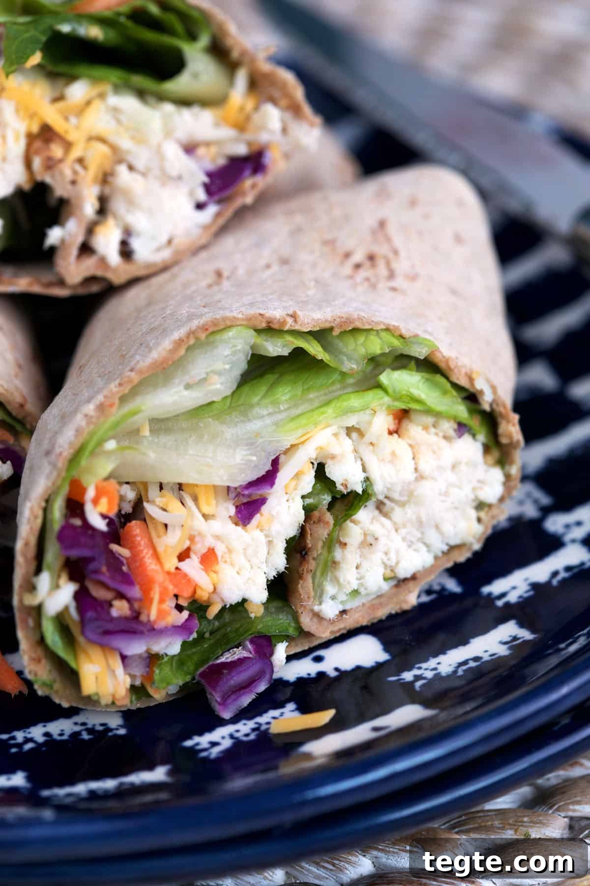 Chick-fil-A Cool Wrap: Chicken & Fresh Veggie Wrap Review 5 Closeup of cut Chick-fil-A Cool Wrap on plate
