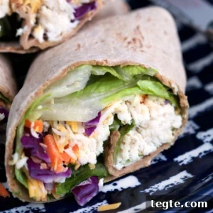 Chick-fil-A Cool Wrap: Chicken & Fresh Veggie Wrap Review 7 Closeup of cut Chick-fil-A Cool Wrap on plate