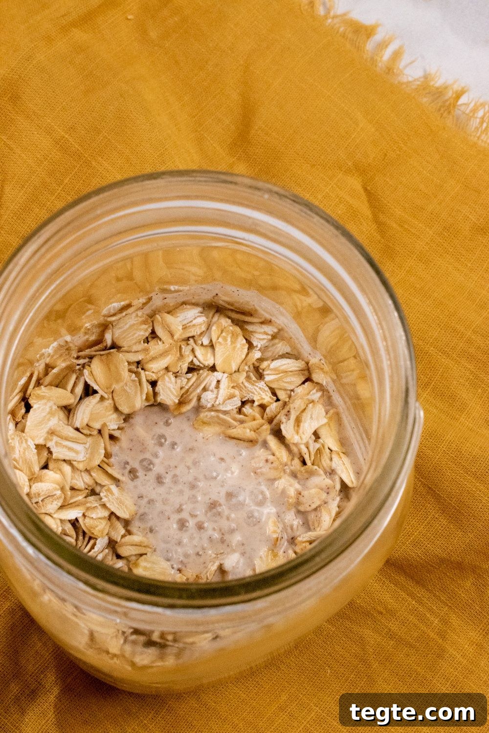 Apple Cinnamon Overnight Oats with Yogurt and Fresh Apples 7 Apple-overnight-oats-in a mason jar