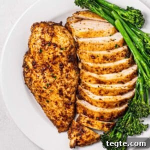 Crispy Juicy Air Fryer Chicken Breast Recipe in 20 Minutes 8 plate of air fryer chicken breasts with broccolini.