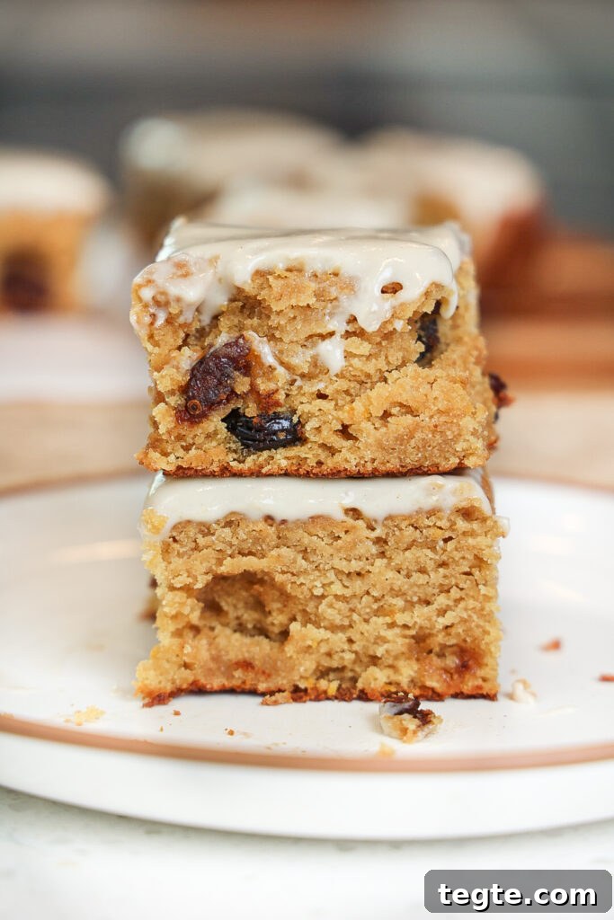 Paleo Cranberry Orange Bars — Gluten-Free Citrus Snack 2 A stack of cranberry orange bars.