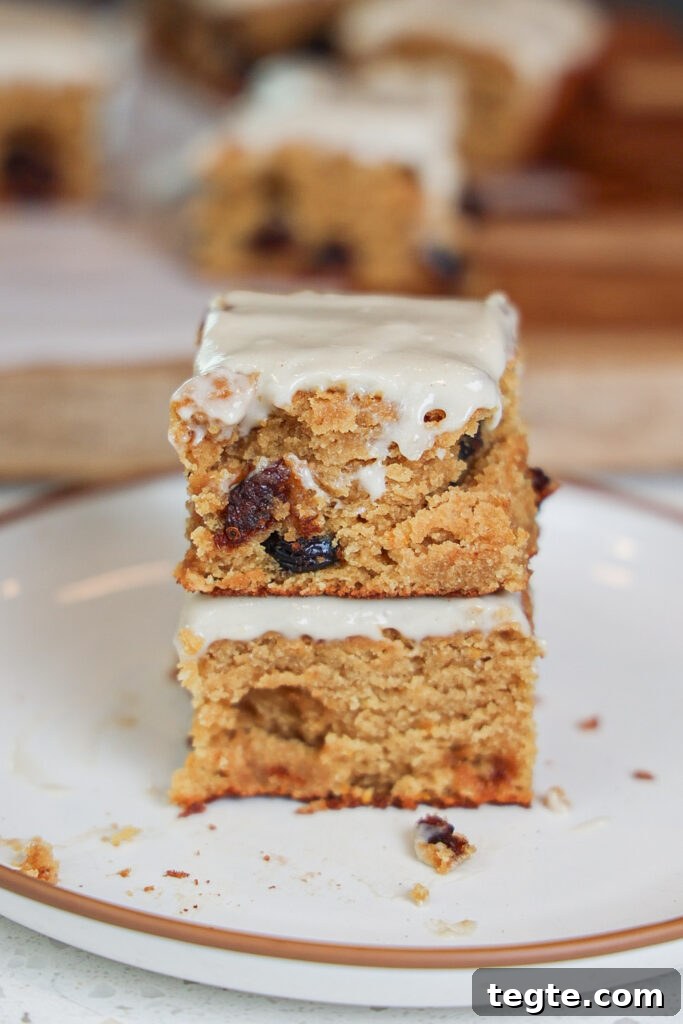 Paleo Cranberry Orange Bars — Gluten-Free Citrus Snack 3 A stack of cranberry orange bars.