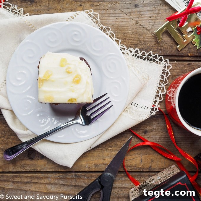 Molasses Gingerbread Cake with Cream Cheese Frosting 3 Slice of gingerbread cake topped with cream cheese frosting.