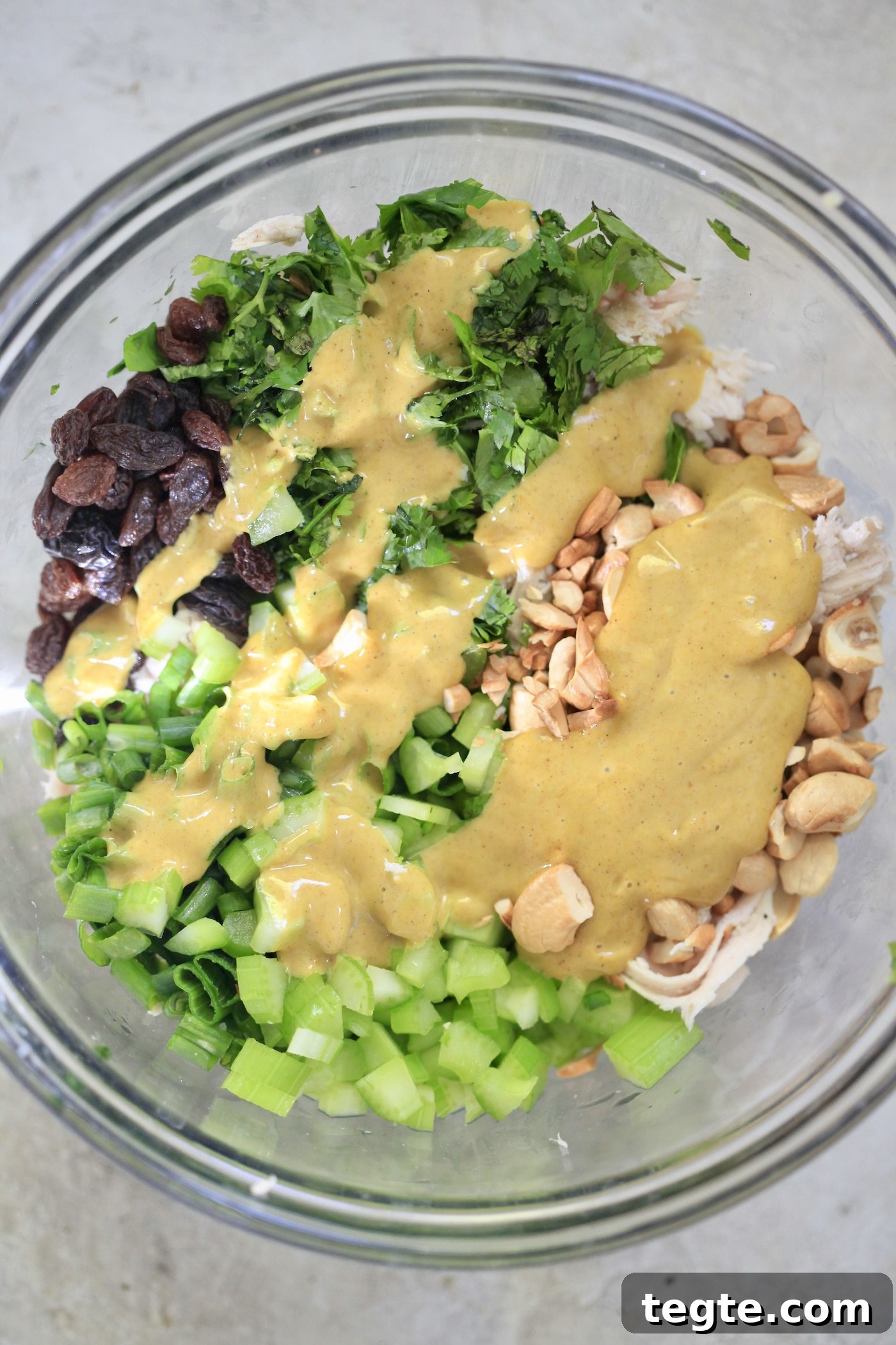 Lightened Curry Chicken Salad Without Mayo — Creamy & Flavorful 5 bowl with chicken, celery, and yellow dressing