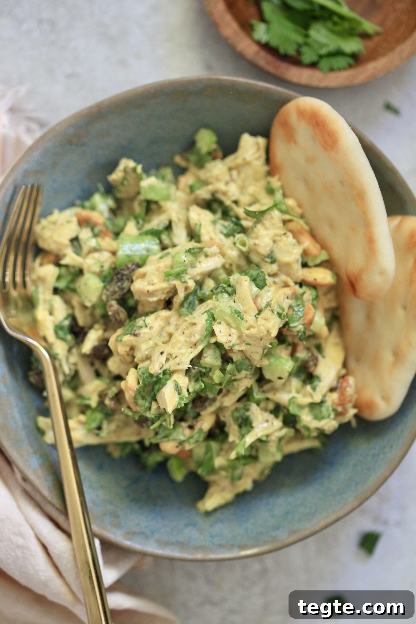 Lightened Curry Chicken Salad Without Mayo — Creamy & Flavorful 6 chicken salad in a blue bowl with bread and fork