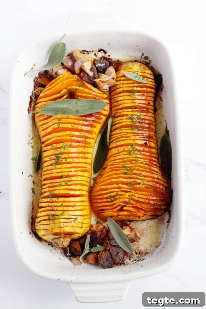 Crispy Roasted Hasselback Butternut Squash Recipe 6 baked butternut squash cut in half and sliced thinly and placed in white ceramic baking sheet