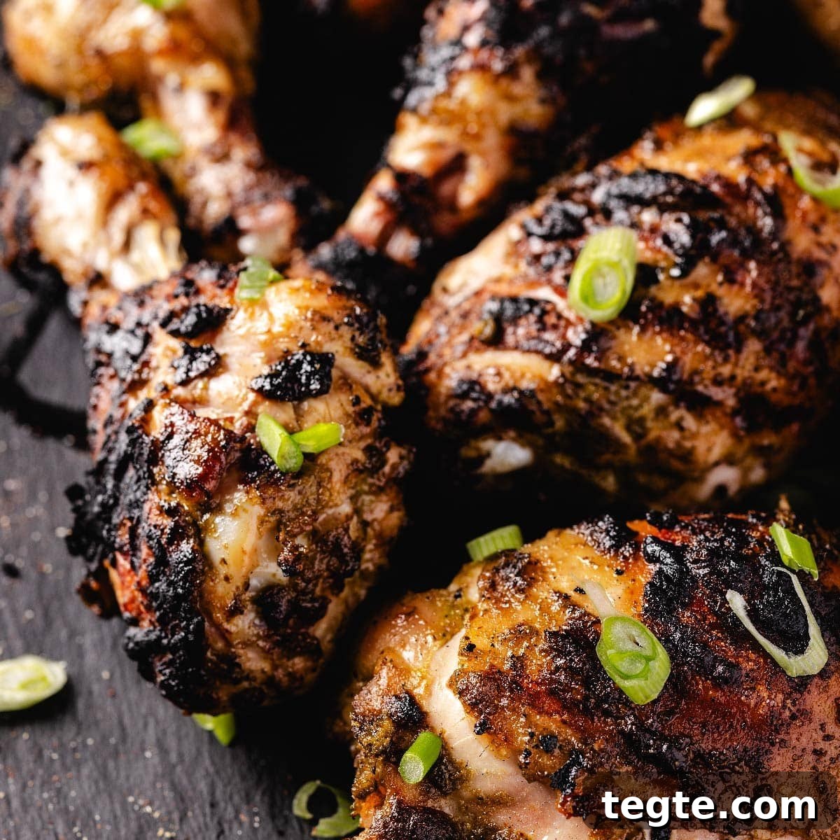 14 Pepper Recipes to Turn Up Flavor on Your Grill 15 Char-grilled chicken drumsticks and thighs garnished with sliced green onions.