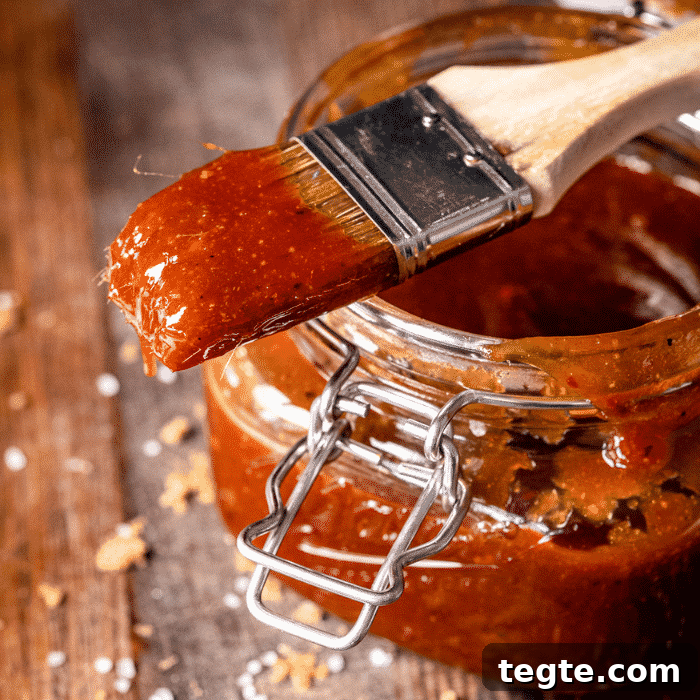 14 Pepper Recipes to Turn Up Flavor on Your Grill 10 Honey chipotle BBQ sauce in a hinged mason jar.