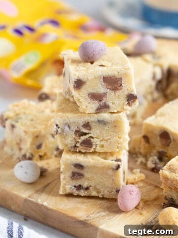 A stack of mini egg shortbread squares.
