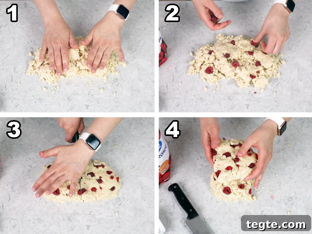 Working the dough into a rectangle, pressing the raspberries into the dough, cutting the dough in half, and stacking the dough halves