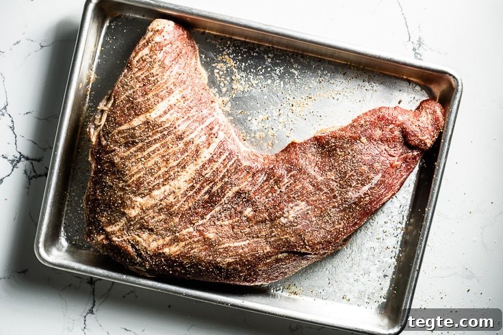 Smoked Tri-Tip Roast: Flavorful Low-and-Slow BBQ Recipe 3 prime tri tip seasoned on sheet pan