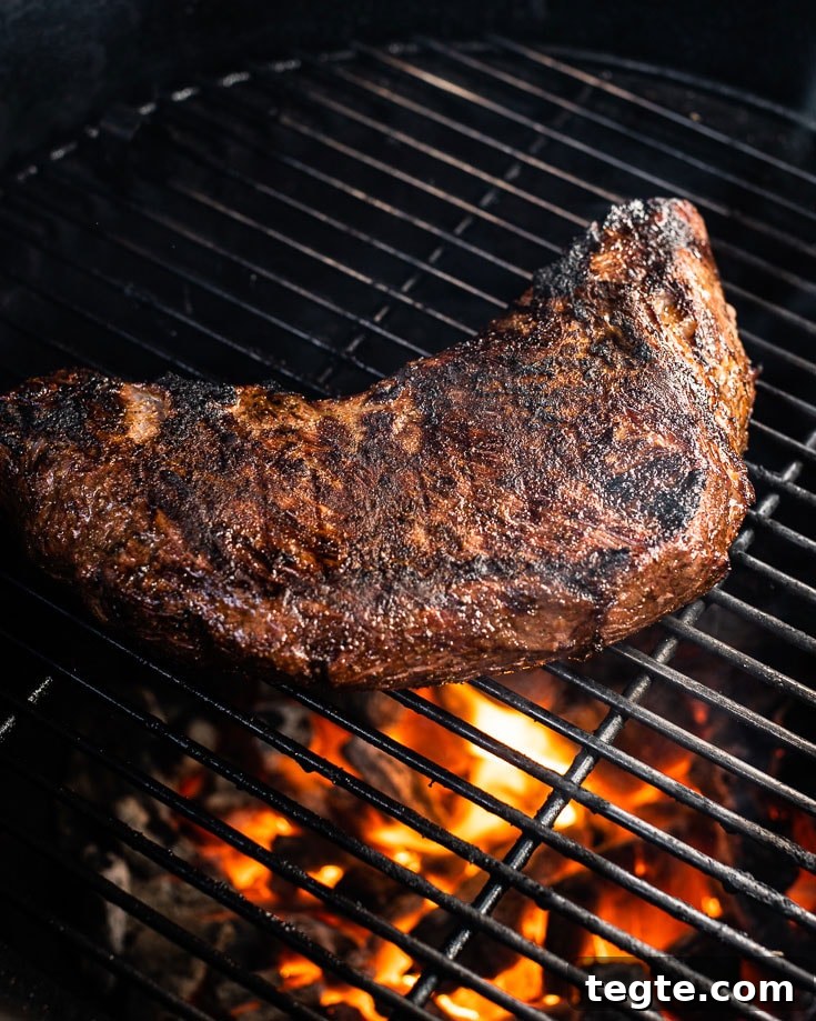 Smoked Tri-Tip Roast: Flavorful Low-and-Slow BBQ Recipe 5 searing smoked tri tip on charcoal