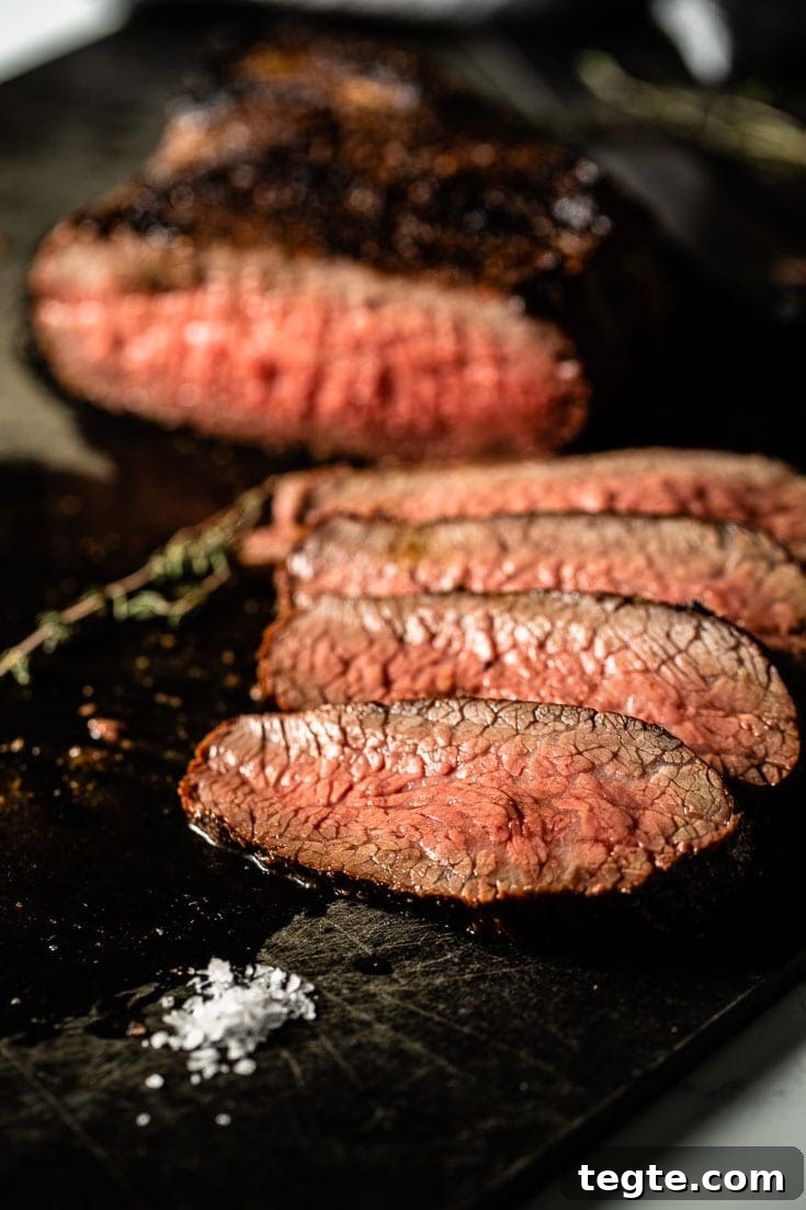 Smoked Tri-Tip Roast: Flavorful Low-and-Slow BBQ Recipe 7 smoked tri tip on cutting board 1