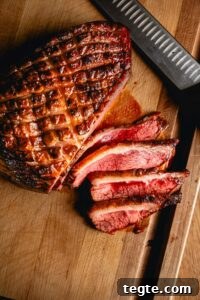 Smoked Tri-Tip Roast: Flavorful Low-and-Slow BBQ Recipe 8 grilled picanha sliced on cutting board