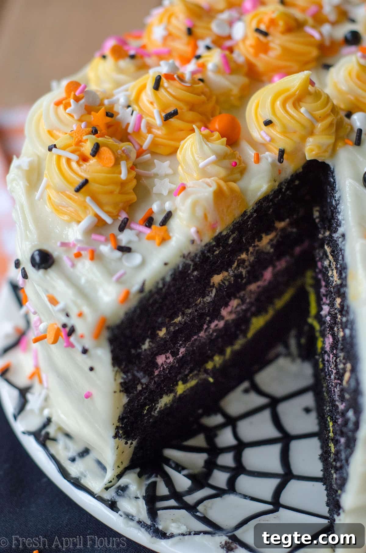 Ultimate Black Velvet Cake Recipe: Moist, Decadent Chocolate Layer Cake 4 black velvet layer cake with a slice taken out of it