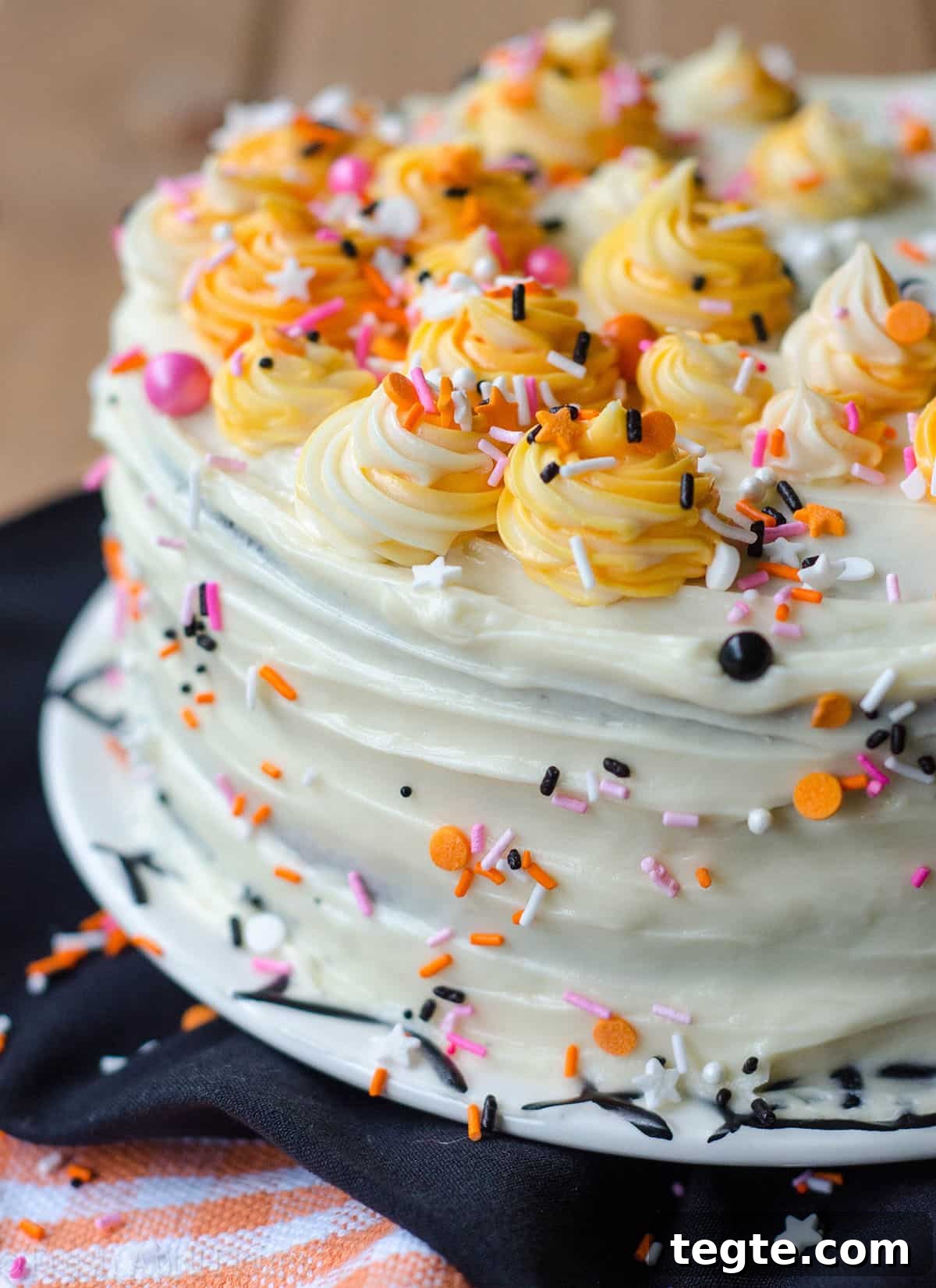 Ultimate Black Velvet Cake Recipe: Moist, Decadent Chocolate Layer Cake 5 black velvet layer cake decorated with pink and orange sprinkles