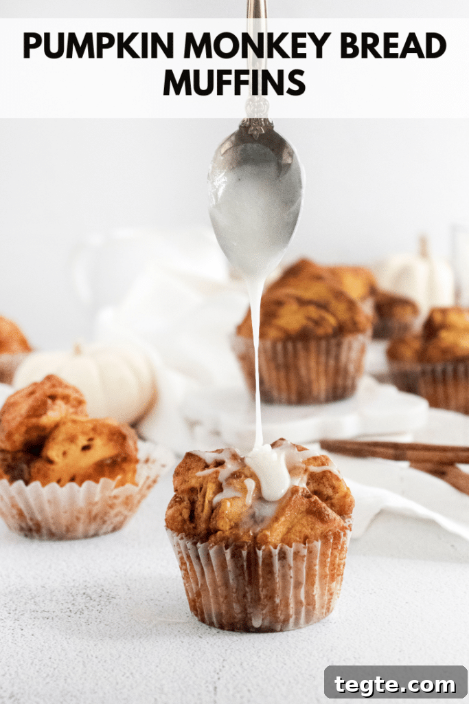pumpkin monkey bread getting drizzled with icing