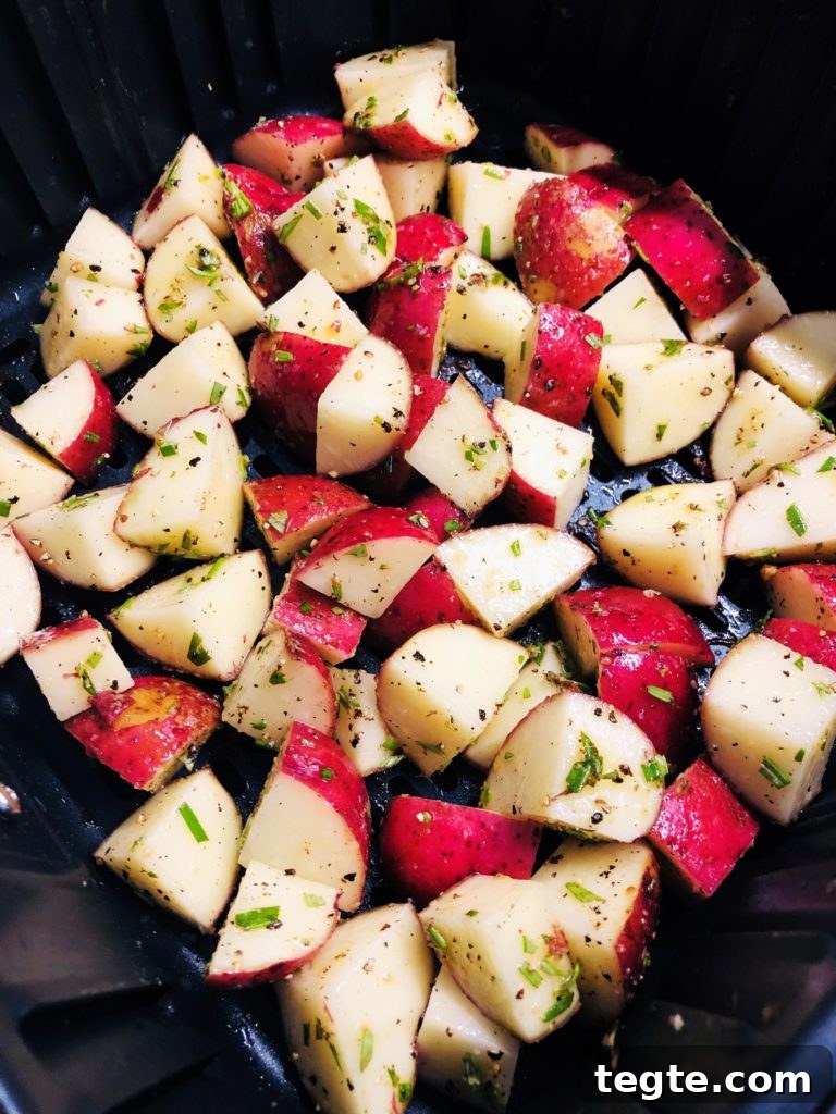 Crispy Air Fryer Garlic and Rosemary Potatoes 4 diced potato before cooking