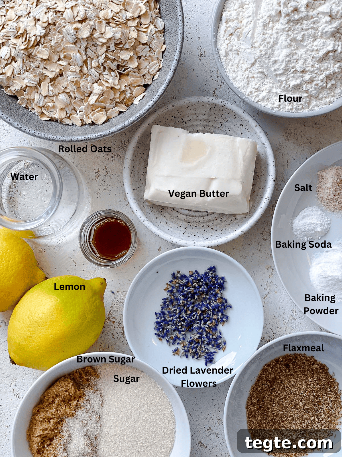 Lemon Lavender Cookie Recipe for Light, Fragrant Treats 3 ingredients for Lemon Lavender Cookies measured out on a white surface