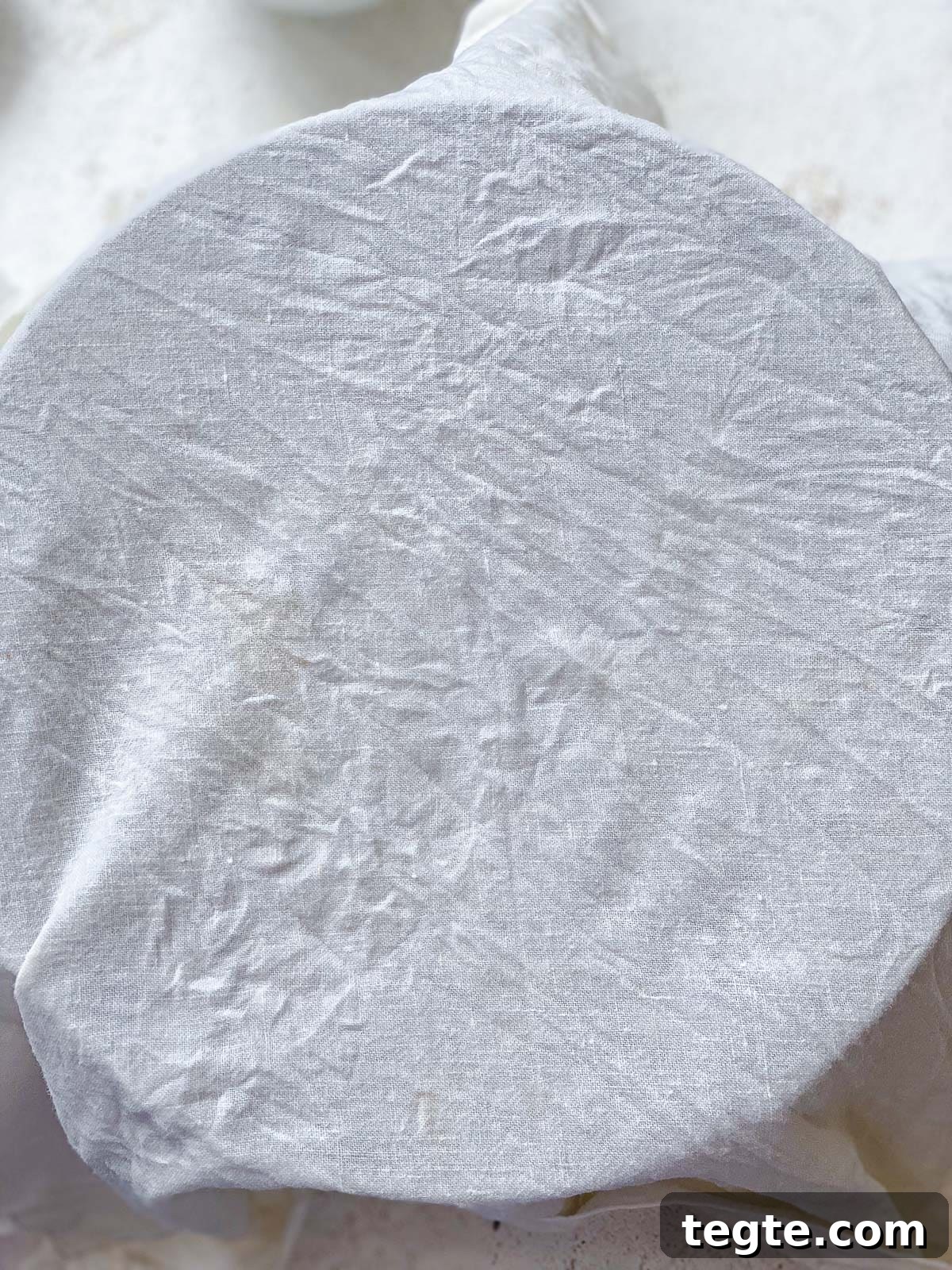 Lemon Lavender Cookie Recipe for Light, Fragrant Treats 7 process shot showing towel covering bowl od dough