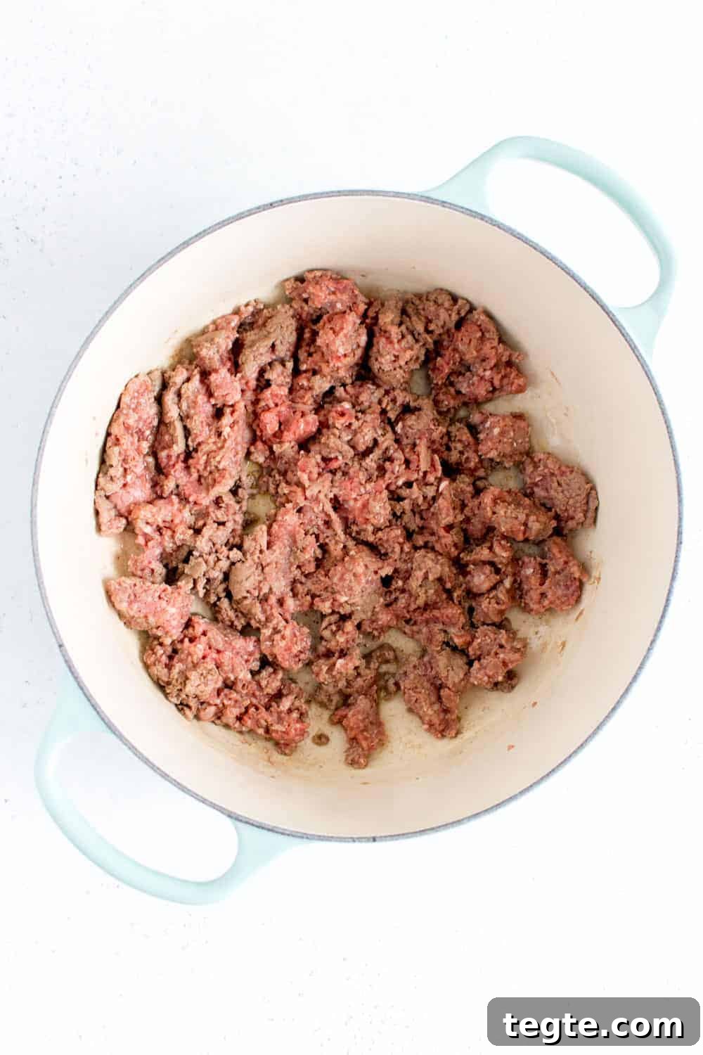 Browned beef in a pot.