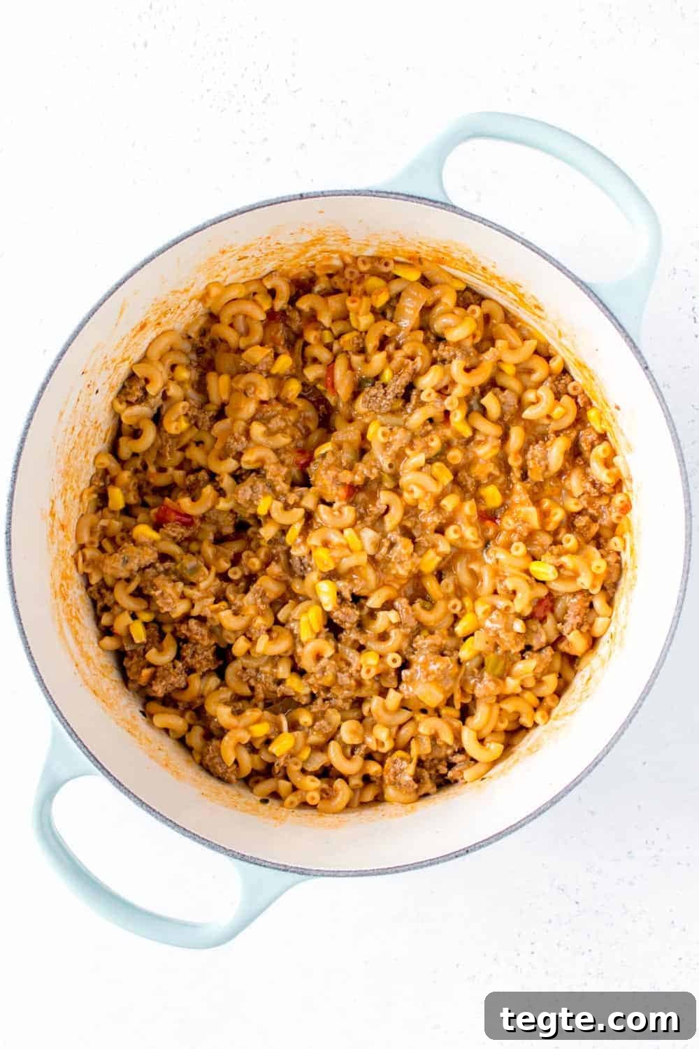 A pot with salsa beef pasta.