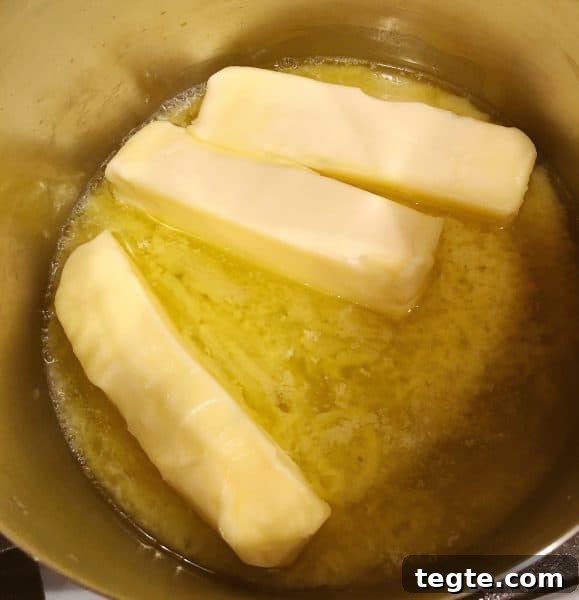 Perfect Roast Thanksgiving Turkey Recipe 16 Butter melting in pan