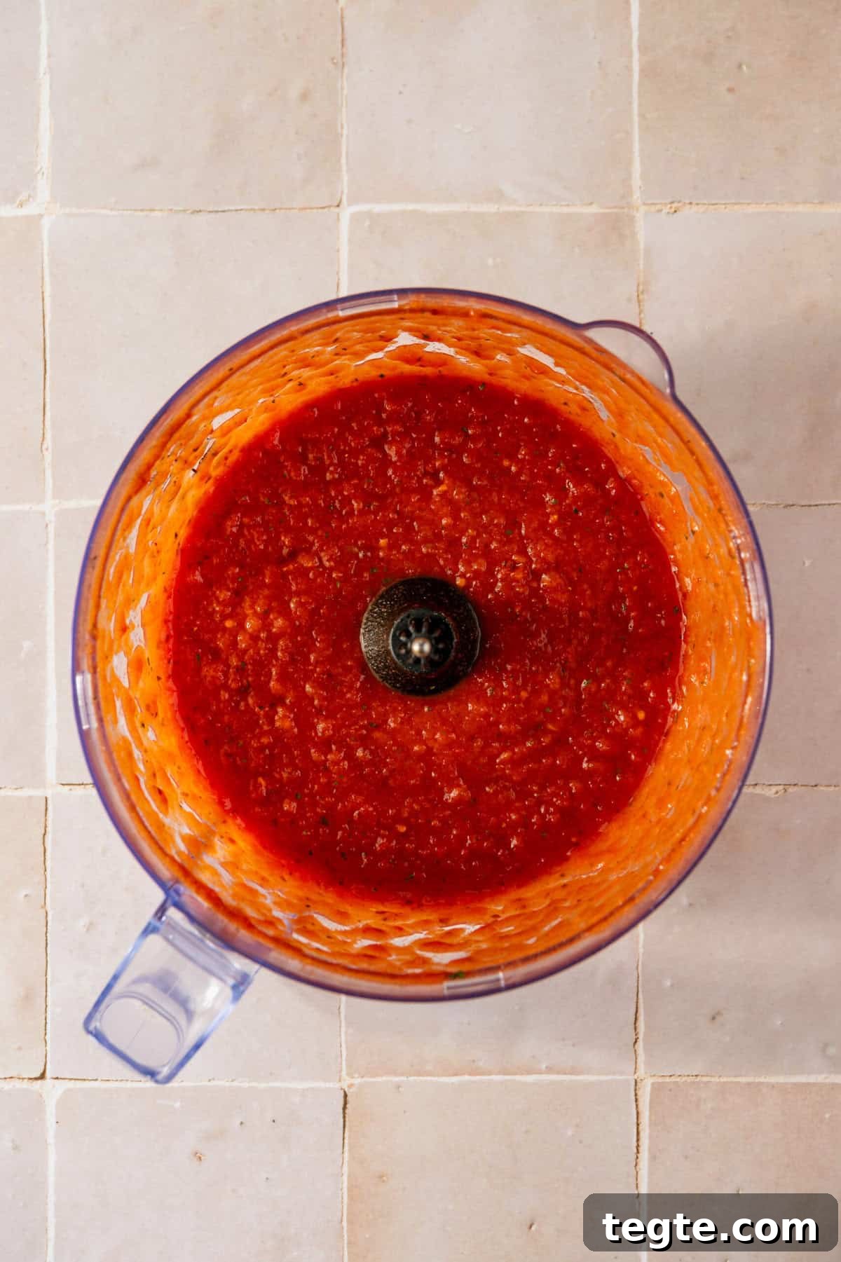 Lean Ground Beef Sloppy Joes with Tangy Tomato Sauce 5 A blender with tomato sauce in it.