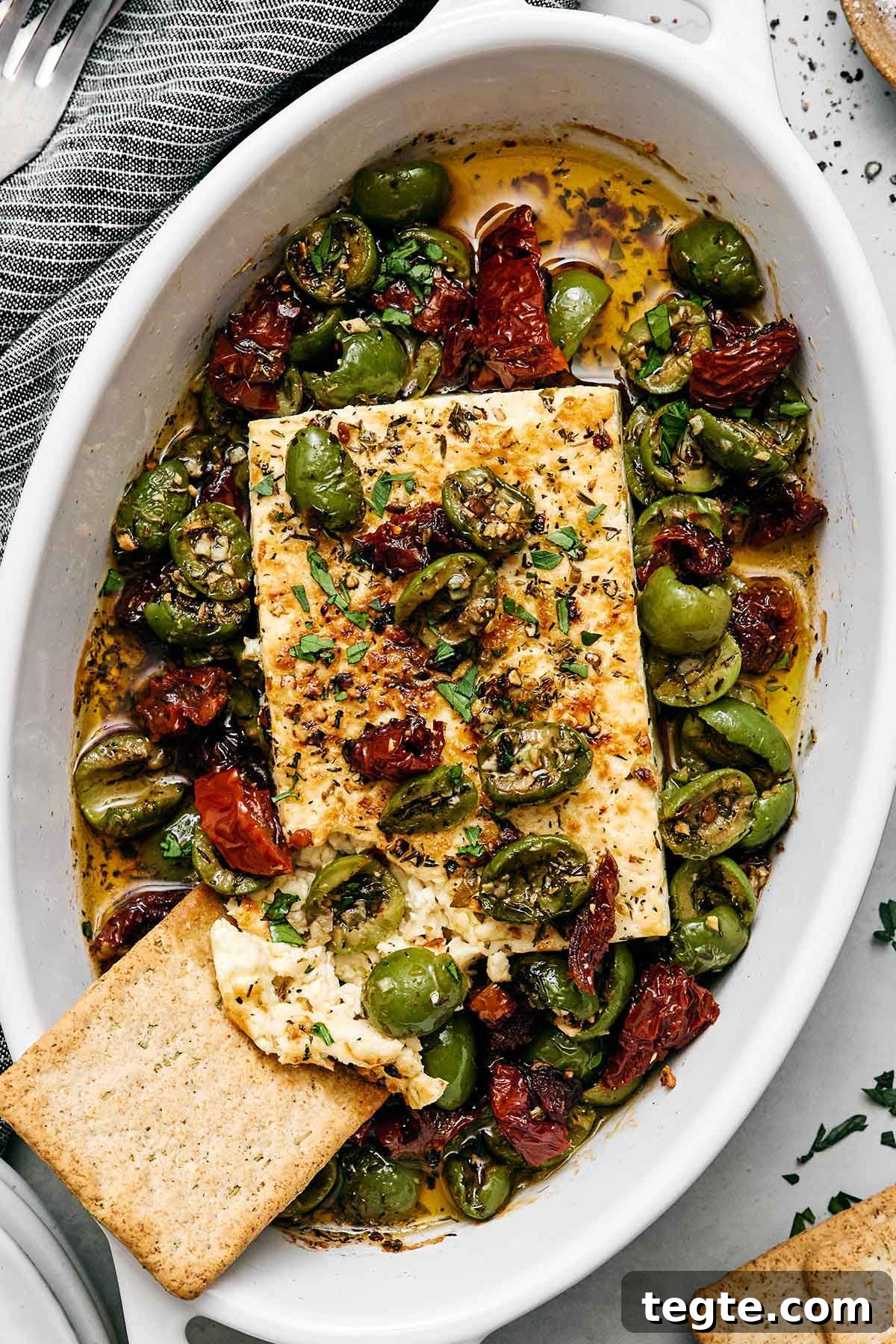 13 Festive Christmas Appetizers Your Guests Will Love 2 Christmas appetizers featuring a baked Mediterranean feta cheese.