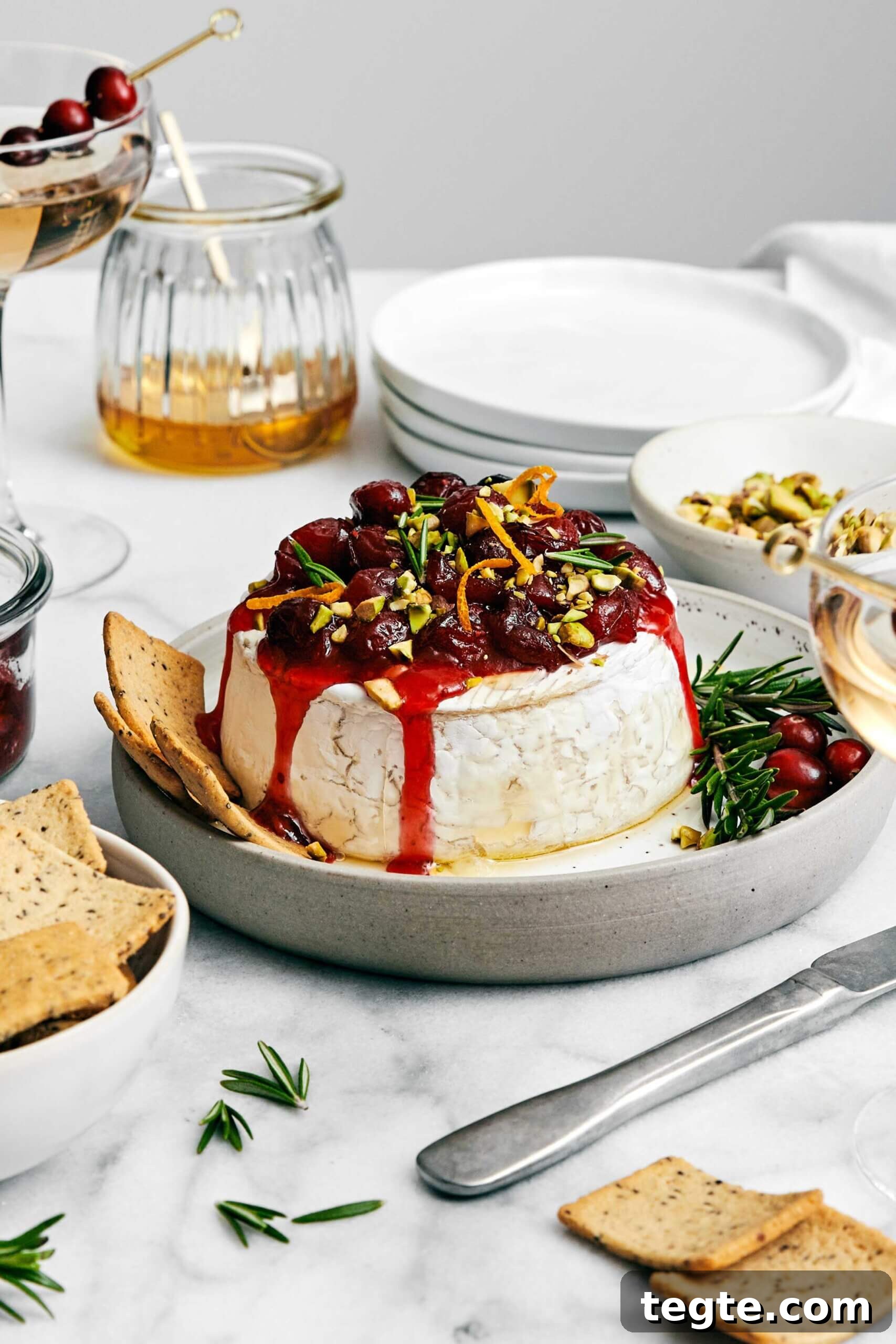13 Festive Christmas Appetizers Your Guests Will Love 7 Baked brie with cranberry sauce.