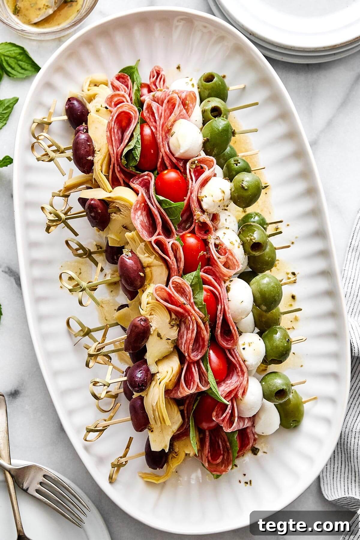 13 Festive Christmas Appetizers Your Guests Will Love 8 A platter of antipasto skewers for the best appetizer.